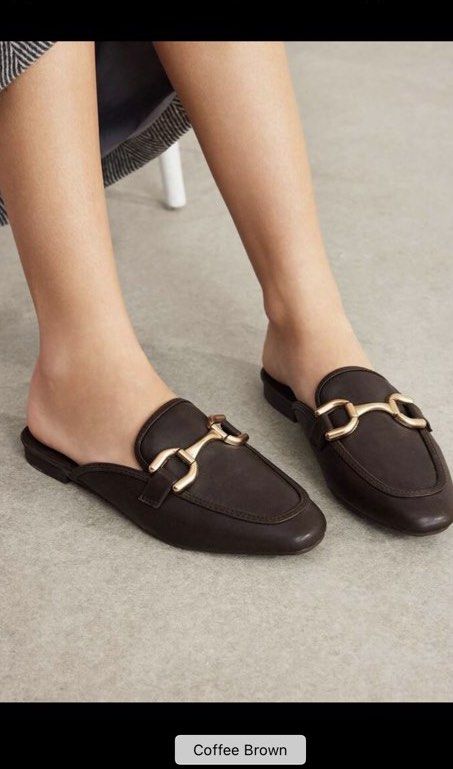 Coffee Brown Mule Loafers (Category: Loafers) located in Taguig. Submitted by heyitsfrann (Listing ID 1467136813, Image 1). Description: - Color: Rich coffee brown - Style: Slip-on mules with flat heels - Detail: Elegant gold-tone horsebit hardware - Toe: Chic pointed silhouette - Versatility: Perfect for office wear and casual everyday outfits.