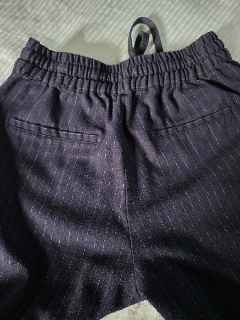 Colin's Navy Pinstripe Drawstring Trousers Size S (Category: Other Bottoms) located in Manila. Submitted by mhelcgm (Listing ID 1467071848, Image 2). Description: - Brand/Model: Colin Navy Blue Trousers - Pattern: White pinstripes - Size: S (tag attached) - Fit: Relaxed wide-leg - Waist: 24 to 32 inches (elastic band with adjustable drawstring) - Length: 36 inches - Pockets: Two back welt pockets - Material: Super comfortable.