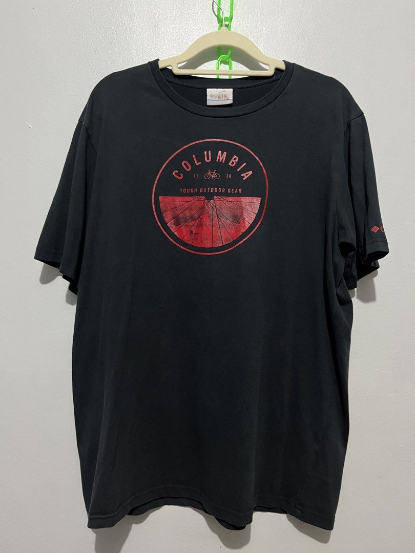 Columbia bike tee (Category: Activewear) located in Cebu City. Submitted by thrift.sht (Listing ID 1467033140, Image 1). Description: Columbia Outdoor Tee 🚲 ✔ Brand: Columbia - Tough Outdoor Gear ✔ Color: Black / Red print ✔ Size: L-XL (oversized) ✔ Condition: 9/10 - black pa kaayo, no crack ✔ Design: Bike wheel graphic - 1938 📍 Cebu City Meet up / J&T / LBC.