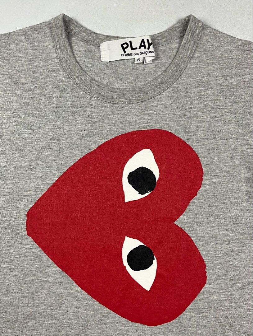 Comme des Garçons x Play - Side Heart Logo Tee (Category: Tshirts & Polo Shirts ) located in Puerto Princesa. Submitted by rrugsgallery (Listing ID 1467104452, Image 3). Description: Comme des Garçons x Play - Side Heart Logo Tee Tagged Size: Medium Length: 26 Width: 17.5 Condition: Excellent Color rate: 9.5 Flaws: None.