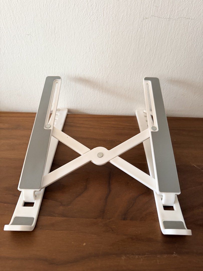 Foldable computer stand (Category: Tables & Sets) located in Singapore. Submitted by meiyangyang (Listing ID 1467054723, Image 1). Description: - Colour: White and grey - Computer stand.