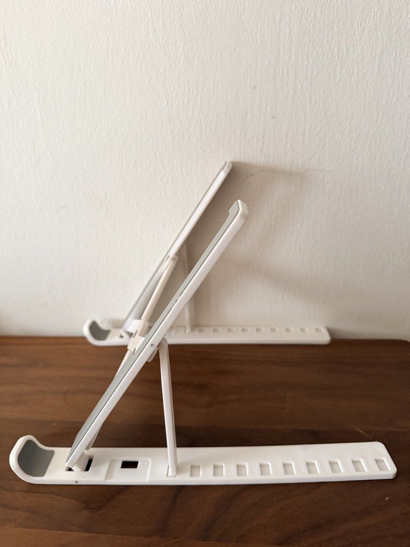 Foldable computer stand (Category: Tables & Sets) located in Singapore. Submitted by meiyangyang (Listing ID 1467054723, Image 3). Description: - Colour: White and grey - Computer stand.