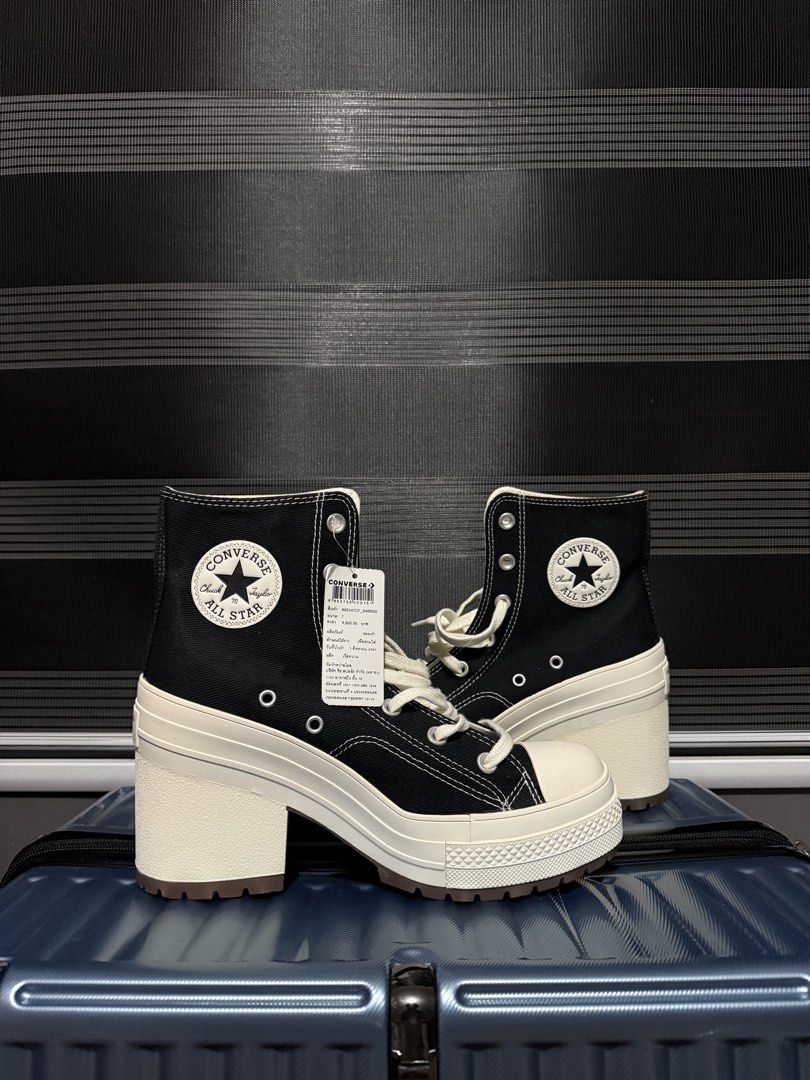 Converse Chuck 70 De Luxe Heel High Top (Category: Sneakers) located in Paranaque City. Submitted by geewagen (Listing ID 1467095570, Image 2). Description: AUTHENTIC/ORIGINAL - Brand: Converse - Bought in Thailand - Size: US Men's 7 / Women's 9 / UK 7 / EUR 40 (25.5 cm) - Condition: Brand new, unworn with original tags attached - Color: Classic black and white with contrast stitching.