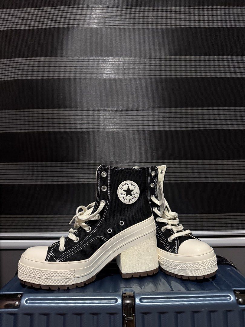 Converse Chuck 70 De Luxe Heel High Top (Category: Sneakers) located in Paranaque City. Submitted by geewagen (Listing ID 1467095570, Image 1). Description: AUTHENTIC/ORIGINAL - Brand: Converse - Bought in Thailand - Size: US Men's 7 / Women's 9 / UK 7 / EUR 40 (25.5 cm) - Condition: Brand new, unworn with original tags attached - Color: Classic black and white with contrast stitching.