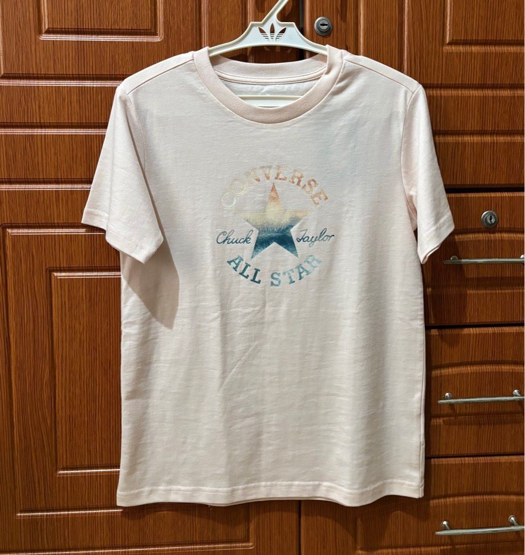 Converse Chuck Patch Infill Women Tee XS - Small (Category: Shirts) located in Quezon City. Submitted by beckyshop2024 (Listing ID 1467152206, Image 1). Description: - Brand new with tag - Original from US - Color: Pale Petal - Slim Fit - Runs big, XS on tag, fits up to Small.