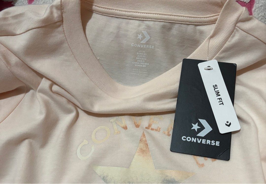 Converse Chuck Patch Infill Women Tee XS - Small (Category: Shirts) located in Quezon City. Submitted by beckyshop2024 (Listing ID 1467152206, Image 2). Description: - Brand new with tag - Original from US - Color: Pale Petal - Slim Fit - Runs big, XS on tag, fits up to Small.
