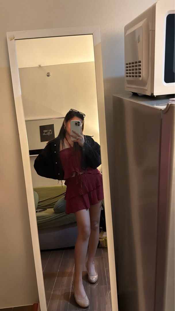 Coords for Party (Category: Sets or Coordinates) located in Makati City. Submitted by skyweeka (Listing ID 1467134207, Image 2). Description: - Color: Rich maroon / red - Set includes: Halter neck crop top with front tie and tiered ruffle matching skirt - Condition: Worn once for a night out, great overall condition - Material: Lightweight and comfortable - Versatility: Easy to style as a complete set or wear separately with other closet pieces B