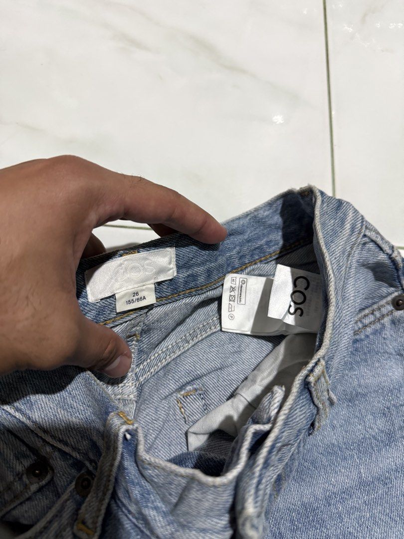 COS Light Wash Denim Shorts Size 26 (Category: Shorts) located in Manila. Submitted by preciousma24494 (Listing ID 1467048364, Image 3). Description: - Brand: COS - Style: Light wash denim shorts - Fit: Mid-rise with classic five-pocket styling - Details: Metal button closure, contrast stitching - Size: 28 fitting - Condition: Great pre-loved basic for warmer weather.