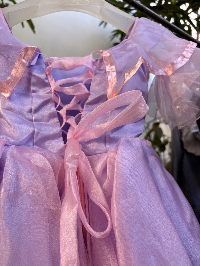 Costume- Encanto : Isabela Madrigal (Category: Babies & Kids Fashion) located in Catarman. Submitted by hyukissco (Listing ID 1467012616, Image 2). Description: Gown - used once sa english month lang. 5-7 yo.