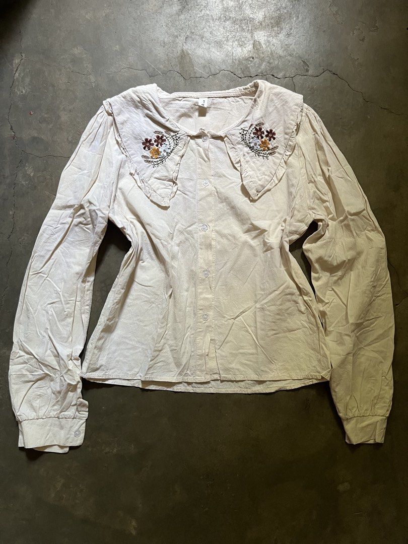 Cream-colored long-sleeve button-down blouse (Category: Longsleeves) located in Manila. Submitted by ljpgdn (Listing ID 1467045183, Image 1). Description: Dm me for more deets :).