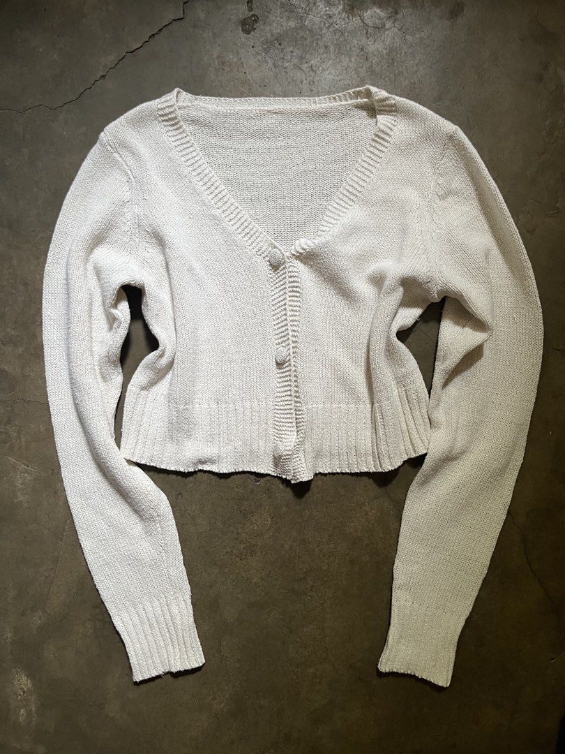Cream-colored V-neck knit cardigan (Category: Longsleeves) located in Manila. Submitted by ljpgdn (Listing ID 1467049433, Image 1). Description: Dm me for more deets :).