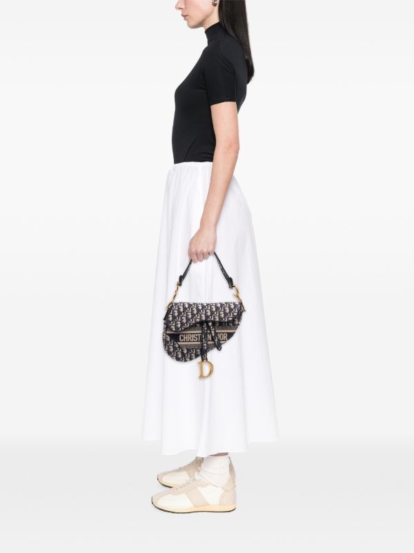 Cristian Dior Saddle Bag (Category: Luxury Bags & Wallets) located in Glan. Submitted by cpaharodde48008 (Listing ID 1467115474, Image 1). Description: Cristian Dior Saddle Bag Very good Condition.