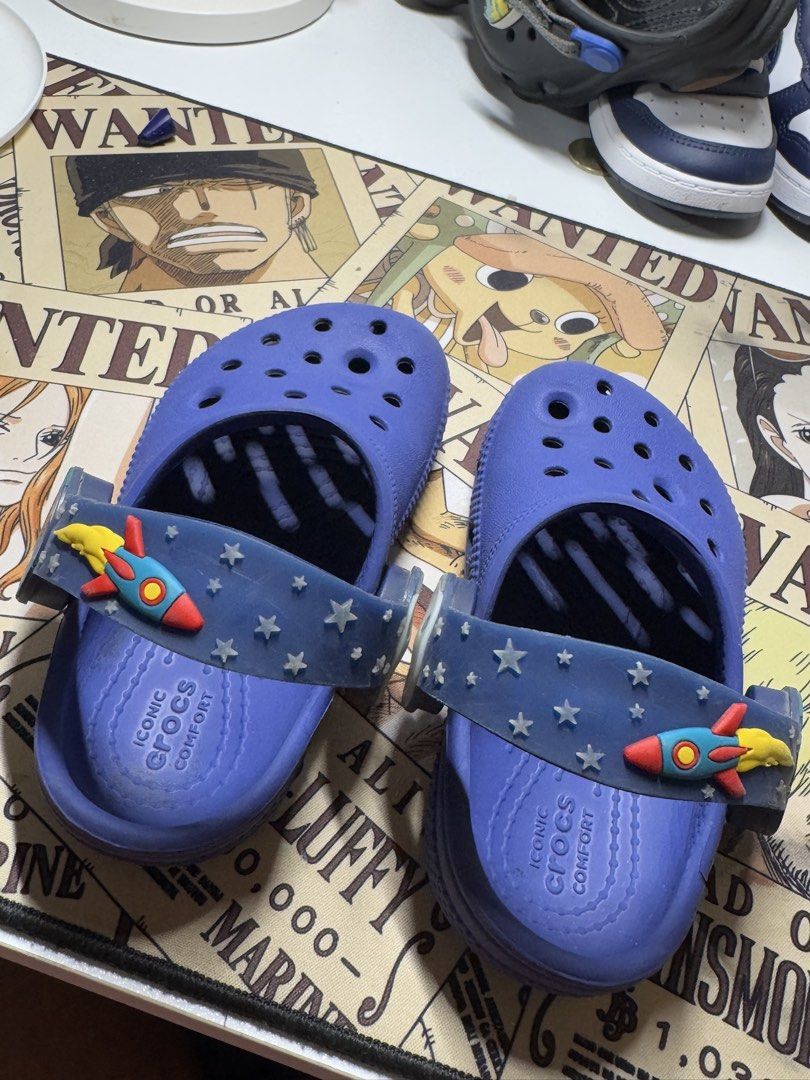 Crocs C Imagination Lights Backstrap (Category: Babies & Kids Fashion) located in Pasig City. Submitted by clarissab._2323 (Listing ID 1467140157, Image 3). Description: - Size: C8 kids - Color: dark Blue - Back Strap Lights still working - includes 2 jibbitz ( robot and helicopter) - Comfort: Iconic Crocs comfort footbeds - Condition: Minor wear on soles from normal use, overall still in great shape - needs cleaning .
