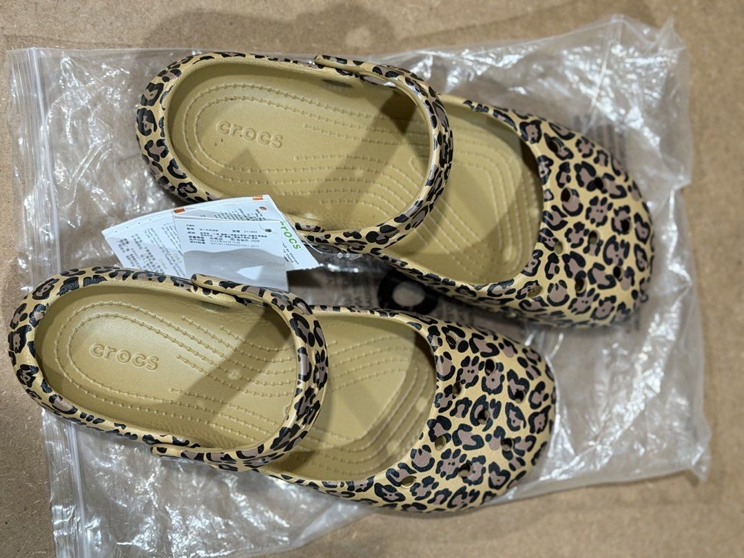 Crocs Classic Leopard Print Mary Jane Clogs Shoes (Category: Flats & Sandals) located in Manila. Submitted by chmpgn.dreyes999 (Listing ID 1467007091, Image 2). Description: - Brand: Crocs - Style: Classic Mary Jane Clogs - Pattern: Trendy leopard animal print - Design: Comfortable slip-on with supportive top strap - Condition: Brand new with original tags and packaging bag - Best for: Casual everyday wear and stylish comfort.