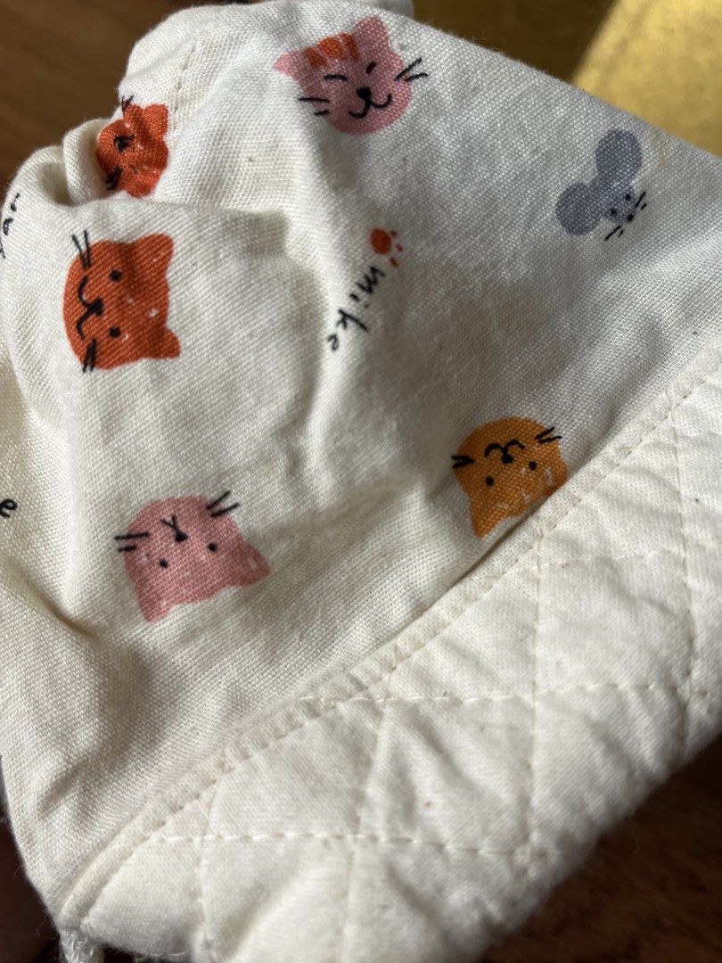 Cute Cat Print Drawstring Pouch Bag (Category: Purses & Pouches) located in Gapan. Submitted by lunashop14 (Listing ID 1467095362, Image 2). Description: - Adorable cream pouch with colorful kitty and mouse prints - Quilted bottom panel for extra structure and durability - White braided drawstrings finished with cute tassels - Clean interior and well-constructed fabric - Perfect size for organizing cosmetics or small items in your tote.