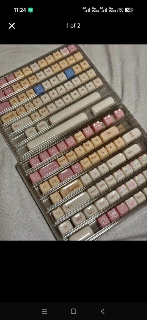 Cute Cat Theme Mechanical Keyboard Keycaps Set (Category: Computer Keyboard) located in Imus. Submitted by jamillabrillantes (Listing ID 1466993258, Image 2). Description: - Full set of custom mechanical keyboard keycaps - Aesthetic pastel pink, cream, and beige colorway - Cute cat-themed design with cat faces, paw prints, and graphics - Features unique rounded cat ear corners on the top profile - Includes alphanumeric keys, function rows, arrows