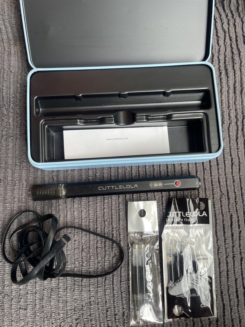 Cuttlelola Electric Dotpen The Black Knight (Category: Stationery & School Supplies) located in Naga. Submitted by sidsaludes (Listing ID 1467075599, Image 3). Description: Hi, I'm selling this Cuttlelola Electric Dotpen (Black Knight Edition) • Condition: Fully tested and 100% working • Perfect for: Dotwork, stippling, and detailed drawing (saves drawing time) •Includes: Original light blue storage tin, USB charging cable, and extra packs of bla