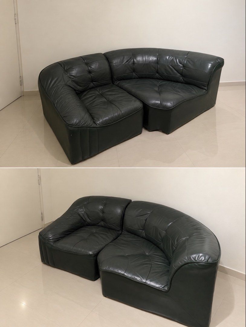 Dark Green Modular Corner Leather Sofa (Category: Sofas) located in San Pedro. Submitted by alphagirly (Listing ID 1467004461, Image 1). Description: - Two-piece modular dark green leather sofa including a curved corner section and an armchair - Crafted from soft leather showing natural creases from regular use - Heavy and durable build designed for long-lasting comfort .