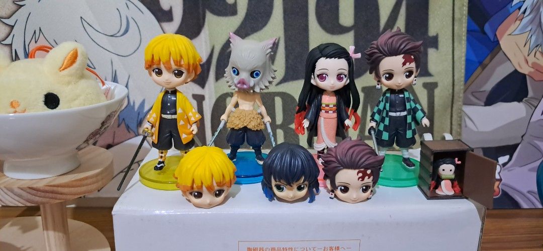 Demon Slayer Anime Chibi Figures Set with Extra Heads (Category: Figurines & Statues) located in Baguio. Submitted by mooncollectibles_000a43 (Listing ID 1467095135, Image 1). Description: - Complete Demon Slayer chibi figure set: Tanjiro, Nezuko, Zenitsu, and Inosuke - Includes 3 extra interchangeable headpieces for dynamic displays - Comes with an exclusive mini Nezuko figure inside her iconic wooden box - Multi-colored plastic collectibles com