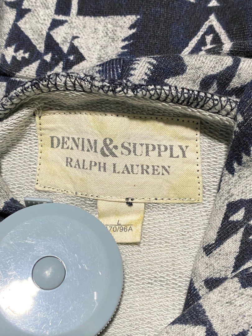 Denim & Supply Ralph Lauren Native Pattern Hoodie Size L (Category: Coats, Jackets and Outerwear) located in Baguio. Submitted by yunothewizardking (Listing ID 1467096028, Image 3). Description: - Brand: Denim & Supply Ralph Lauren - Style: Pullover hoodie with drawstring - Color/Pattern: Navy blue and grey aztec geometric pattern - Details: Large chenille appliqué logo across chest, front kangaroo pocket - Size: Large - Material: 100% Cotton - O