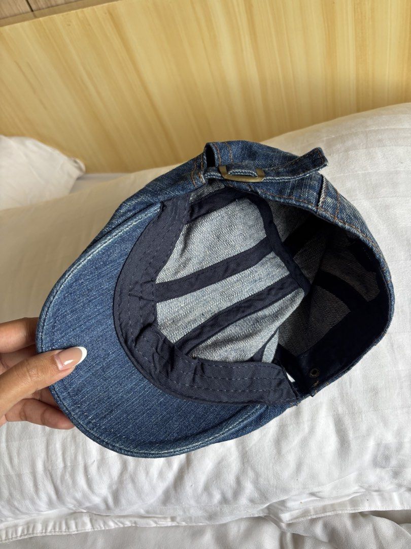 Denim flat cap newsboy hat adjustable buckle (Category: Caps & Hats) located in Manila. Submitted by michaela17_ (Listing ID 1466978899, Image 2). Description: - Dark blue denim flat cap with classic paneled construction - Stylish contrast orange stitching details - Adjustable strap with a secure metal buckle at the back - Comfortable interior with black fabric band and taped seams - Durable material and casual everyday style - Clean inside and o