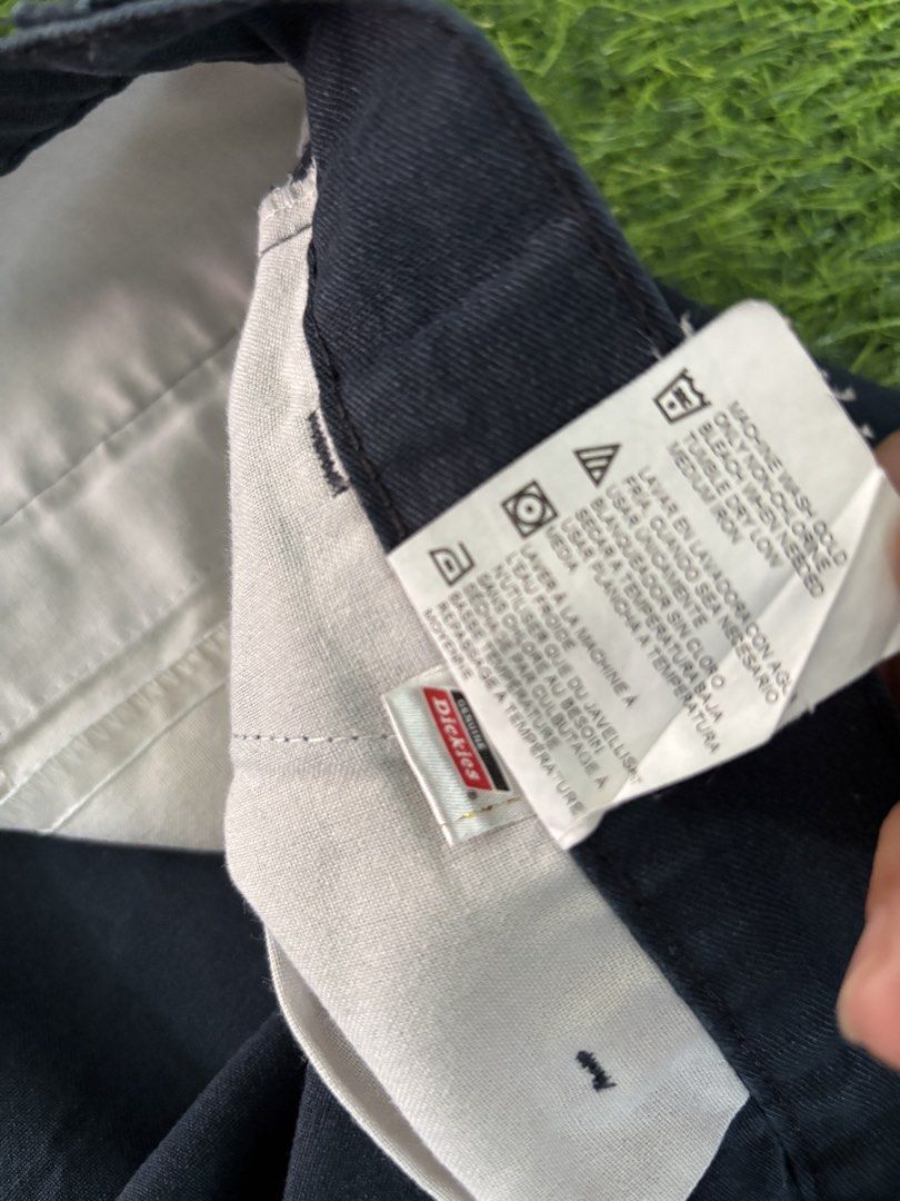 Dickies Black Work Shorts Size 42 (Category: Shorts) located in Makati City. Submitted by rare_thrift_stuff (Listing ID 1467000187, Image 3). Description: - Brand: Dickies - Color: Classic Black - Size: Waist 42 - Material: Durable 65% polyester, 35% cotton fabric blend - Design: Classic multi-pocket utility style with signature logo patch near the hem - Condition: Clean and ready to wear - Ideal for: Everyday wear, skating, or working outdoors.