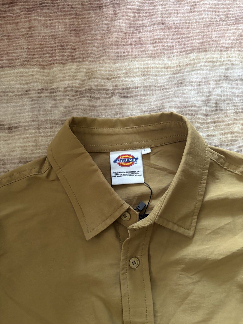 Dickies Brown Nylon Polo Jacket (Category: Coats, Jackets and Outerwear) located in Antipolo. Submitted by thearchivesproject (Listing ID 1467028324, Image 2). Description: 23 width 30.5 length.