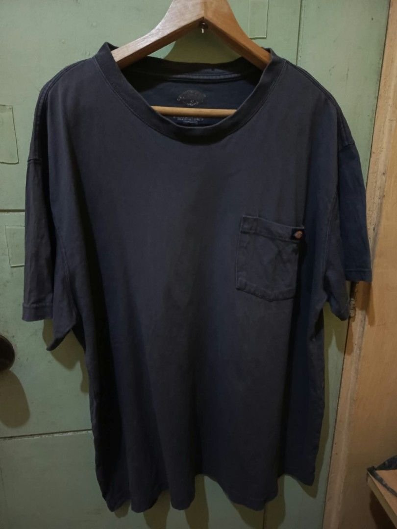 Dickies Pocket T-Shirt Dark Grey (Category: Tshirts & Polo Shirts ) located in Manila. Submitted by collinvien123 (Listing ID 1467099913, Image 1). Description: - Brand: Dickies - Item: Heavy cotton crewneck tee - Color: Dark grey with a cool faded wash look - Size: 2X / 2TG - Features: Single chest pocket with woven logo label - Condition: Pre-loved with normal wear, fabric tag inside side seam is partially torn.