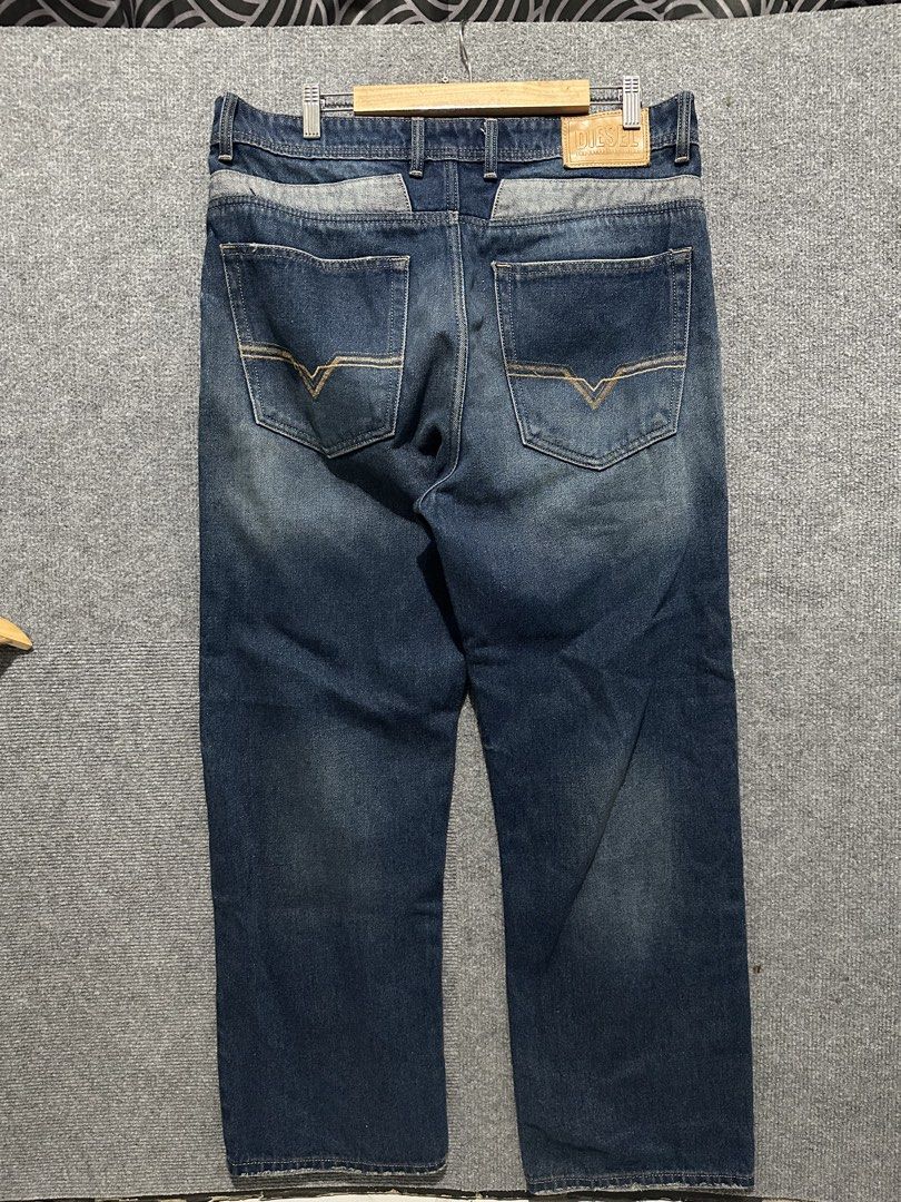 Diesel Blue Denim Jeans (Category: Jeans) located in Villasis. Submitted by justinramosonfb (Listing ID 1467121283, Image 1). Description: - Brand: Diesel - Color/Wash: Blue denim with faded wash - Fit: Straight leg with slight distressing at hem edges - Closure: Classic button fly - Details: Contrast stitching, front pockets, classic back pockets, and rear leather brand patch - Condition: Sturdy denim fabric with interior brand tags.