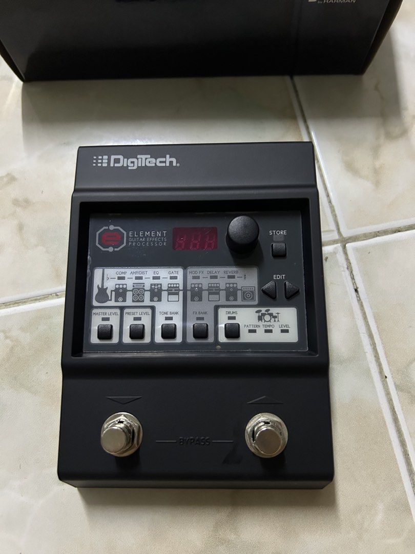 DigiTech Element Guitar Effects Processor (Category: Musical Instruments) located in Puchong. Submitted by ordianlopez (Listing ID 1467082450, Image 3). Description: DigiTech Element guitar effects processor, model ELMTV-02. Multi-effect pedal unit with built-in drum patterns, tone bank, and multiple amp/distortion simulations. Dual foot switches for bypass and control. Serial number clearly printed on the bottom metal plate. Includes the origina