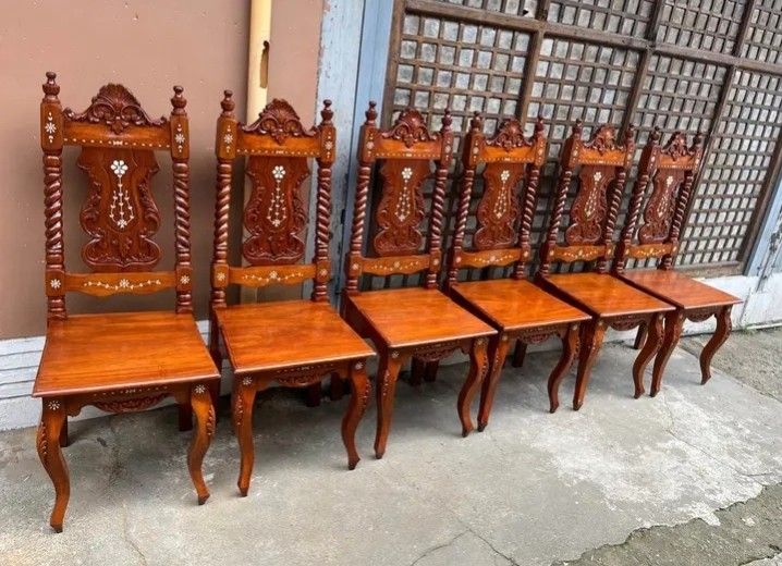 Dining chairs 6pcs beautiful piece narra (Category: Chairs) located in Manila. Submitted by carmelites36250 (Listing ID 1466997068, Image 2). Description: #forsale Dining Chairs 6ocs available ✅ Beautiful piece chairs Bone inlay ❤ Solid narra wood ❤❤❤🎯 Ready to use ❤❤❤ Pick up / Delivery 🚚🚚🚚🚚 Pm me ☎☎☎☎ Price -3500 each.