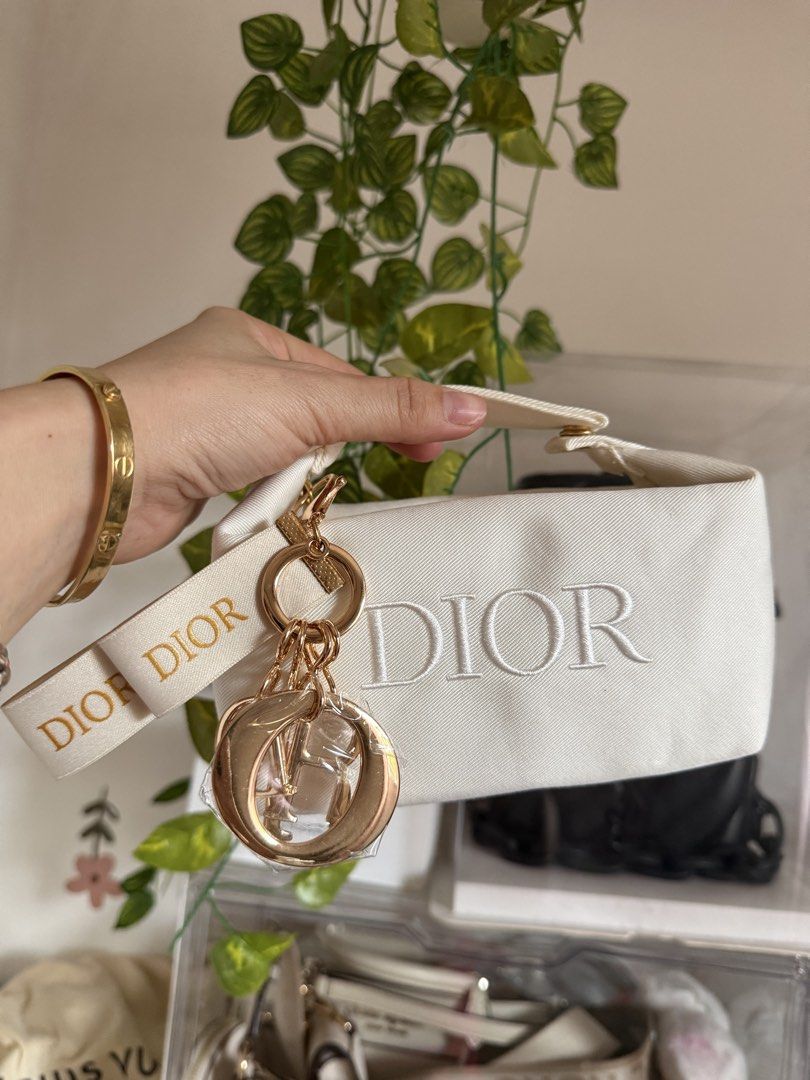 Dior (Category: Luxury Bags & Wallets) located in Manila. Submitted by mariadarna (Listing ID 1467145600, Image 2). Description: Dior Pouch and Keychain Gift With Purchase (GWP) Chain only 900 Pouch/Bag only 900 .