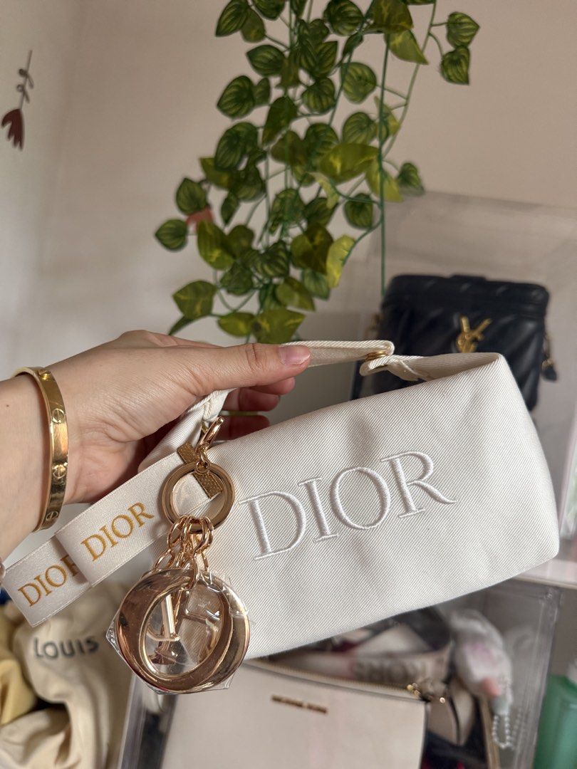 Dior (Category: Luxury Bags & Wallets) located in Manila. Submitted by mariadarna (Listing ID 1467145600, Image 1). Description: Dior Pouch and Keychain Gift With Purchase (GWP) Chain only 900 Pouch/Bag only 900 .