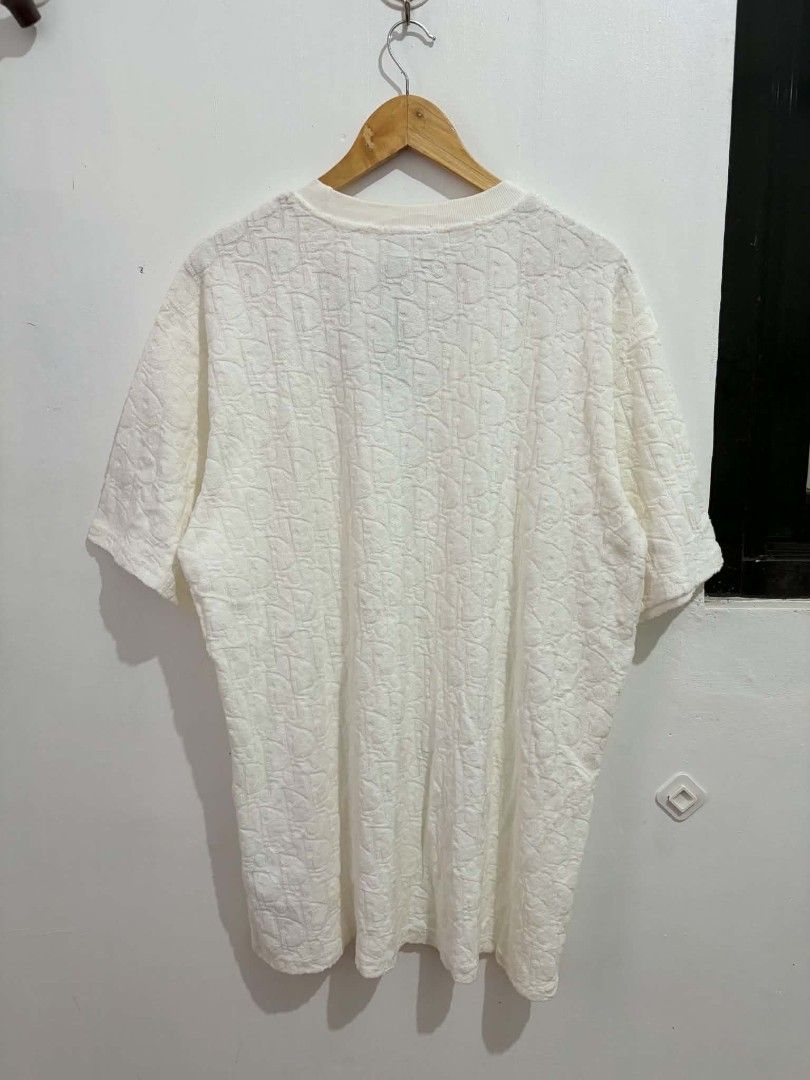 Dior Embossed Monogram Terry Cloth T-Shirt White (Category: Tshirts & Polo Shirts ) located in Daraga. Submitted by argarinang25024 (Listing ID 1467032695, Image 2). Description: - Brand: Dior - Style: Crew neck short sleeve tee with embossed monogram pattern - Material: 100% cotton textured terry cloth - Condition: Brand new with original tags attached - Size: Large - Origin: Made in Italy - Color: Clean white with a soft, plush feel - No issue 