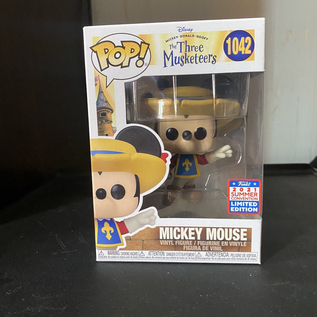 Disney The Three Musketeers Mickey Mouse 1042 (Category: Designer & Blind Box Toys) located in Taguig. Submitted by roderickdelacruz (Listing ID 1467005152, Image 1). Description: Mickey Mouse Funko Pop Vinyl Figure #1042( The Three Musketeers) from 2021 Summer Convention Limited Edition (comes with official sticker) - Mickey Mouse Design: Yellow hat, blue and gold tunic, holding a sword - Perfect for Disney and Funko collectors.