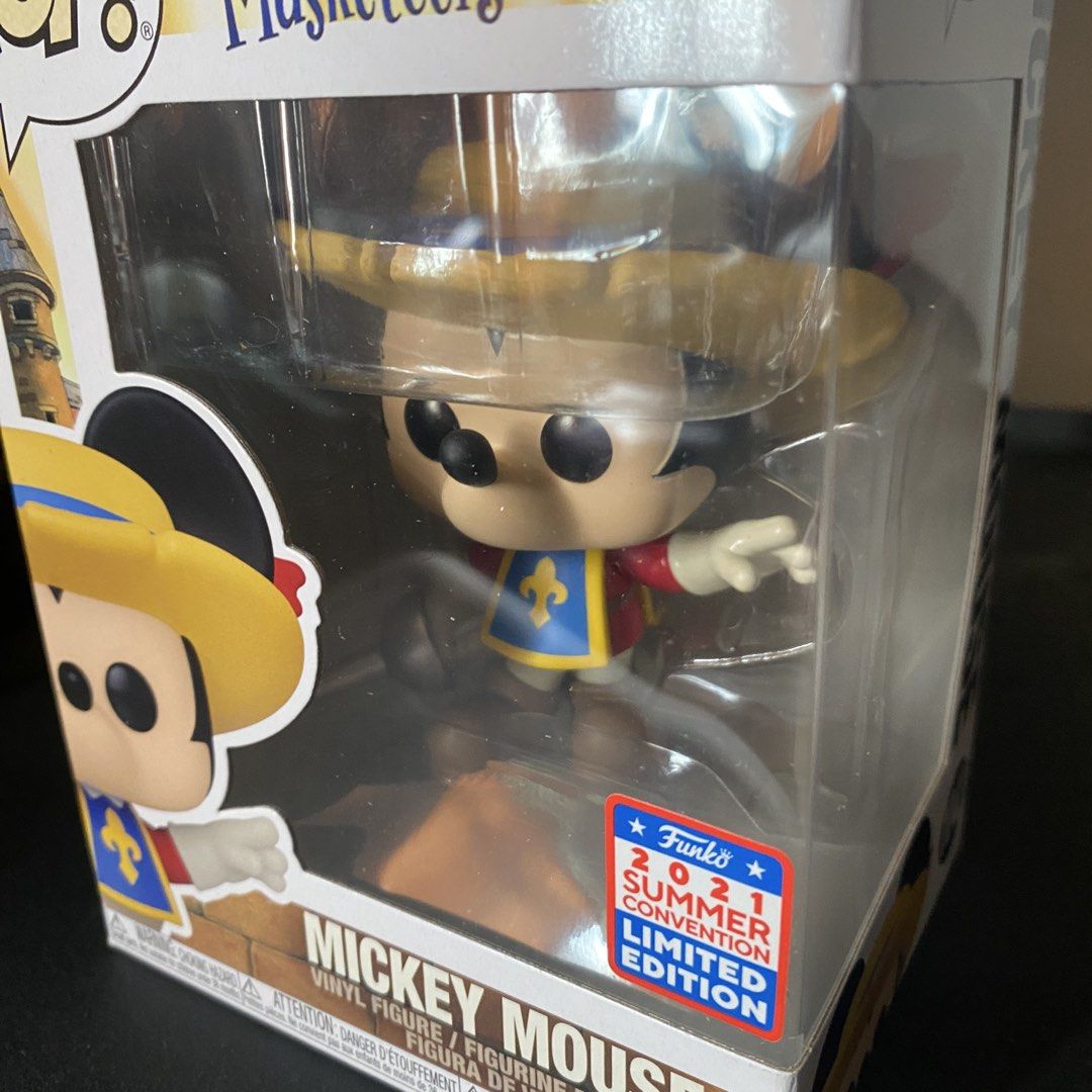 Disney The Three Musketeers Mickey Mouse 1042 (Category: Designer & Blind Box Toys) located in Taguig. Submitted by roderickdelacruz (Listing ID 1467005152, Image 3). Description: Mickey Mouse Funko Pop Vinyl Figure #1042( The Three Musketeers) from 2021 Summer Convention Limited Edition (comes with official sticker) - Mickey Mouse Design: Yellow hat, blue and gold tunic, holding a sword - Perfect for Disney and Funko collectors.