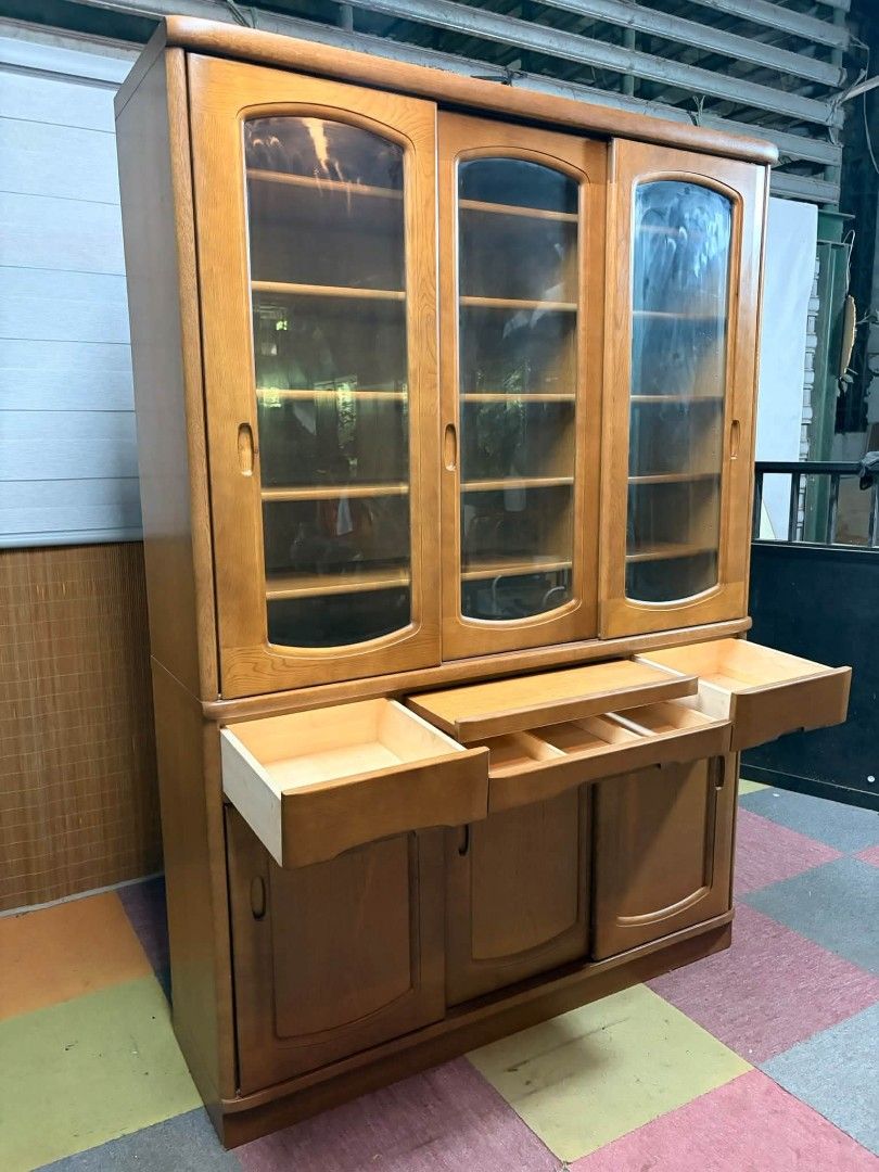 Display Cabinet (Category: Shelves, Cabinets & Racks) located in Meycauayan. Submitted by marygracecasimiro (Listing ID 1467007448, Image 2). Description: KARIMOKU Elegant SLIDING DOORS Cabinet SOLID WOOD!!! VERY HEAVY!!! MAKINIS!!! Very Big Display Cabinet, Cupboard, Platera Vintage Mid-Century Design Diamond cut Glass Doors, Adjustable Shelves This classic piece features a two-tiered design, including an upper hutch with three arched glass slid