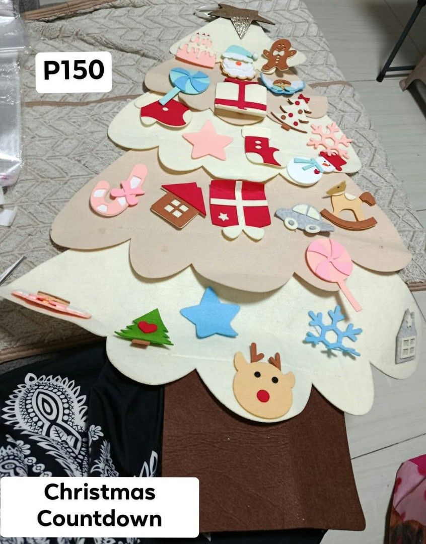 DIY Felt Christmas Tree Countdown Advent Calendar (Category: Handmade Craft) located in Quezon City. Submitted by robelles_thriftshop (Listing ID 1466983768, Image 1). Description: - Interactive felt Christmas tree countdown calendar - Includes various detachable soft felt ornaments (reindeer, gifts, candy canes, snowflakes) - Great holiday activity and bonding time for kids - Charming festive home decor - Durable and reusable year after year.
