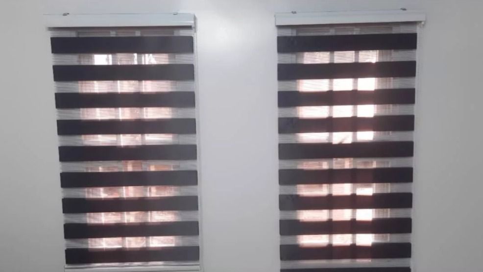 Double Layer Roller Zebra Blinds Vision Window Shades (Category: Curtains & Blinds) located in Manila. Submitted by rarewhale_487098 (Listing ID 1467012344, Image 3). Description: - Product: Double Layer Roller Zebra Blinds - Light Control: Alternating sheer and solid stripes - Colors Available: Grey, brown, maroon, and red,black,dark gray,white,beige,pink,blue,light yellow,nude brown - Style: Modern minimalist with clean geometric lines - Ideal 