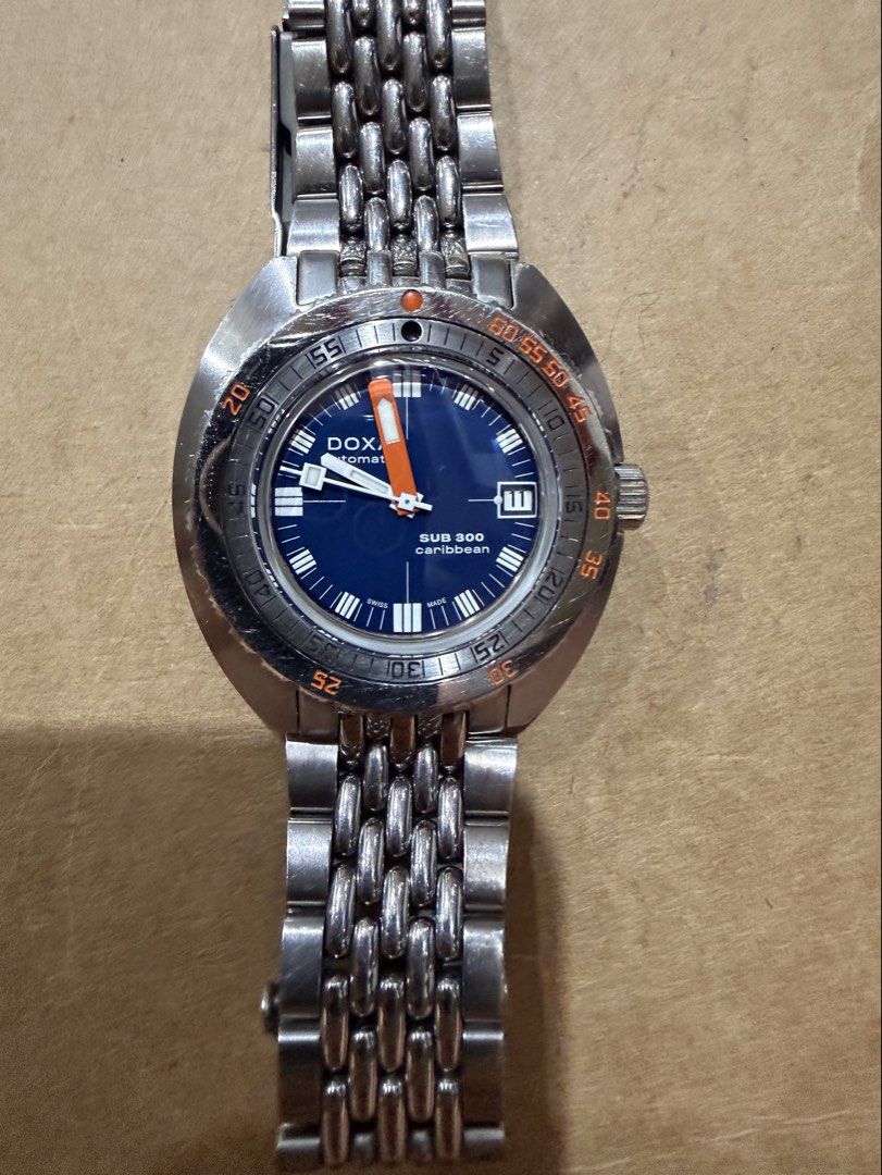 Doxa Sub 300 Caribbean (Category: Men's Watches) located in Butuan. Submitted by swiftflower.6836d6 (Listing ID 1466655055, Image 1). Description: MOVEMENT Swiss mechanical automatic, self-winding, COSC certified Chronometer Power reserve 38 hours CASE Stainless steel case Diameter 42.50 mm x 45.00 mm Height 13.40 mm Screw-down crown Water resistance 30 ATM / 300 meters / 984 feet Stainless steel, screw down case back In good condition. Purchased