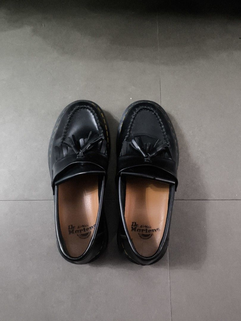 Dr. Martens Black Tassel Loafers (Category: Casual Shoes) located in San Pedro. Submitted by durtvader (Listing ID 1467050648, Image 1). Description: - Brand: Dr. Martens - Style: Slip-on tassel loafers with fringe detail - Material: Premium black leather with signature yellow welt stitching - Condition: Excellent, with minimal creasing and clean soles - Interior: Tan branded insoles - Perfect for smart-casual wear, work, or school.