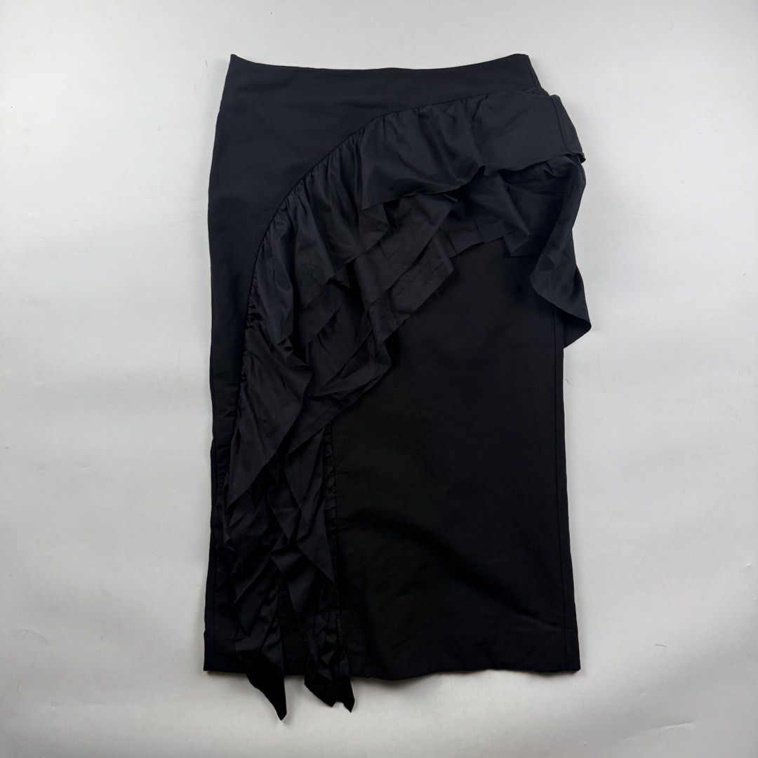Dries Van Noten Asymmetrical Ruffled Midi Skirt (Category: Skirts) located in Manila. Submitted by jademax (Listing ID 1467126563, Image 1). Description: Size 38 Waist: 15” Length: 31” Leg Opening: 20”.