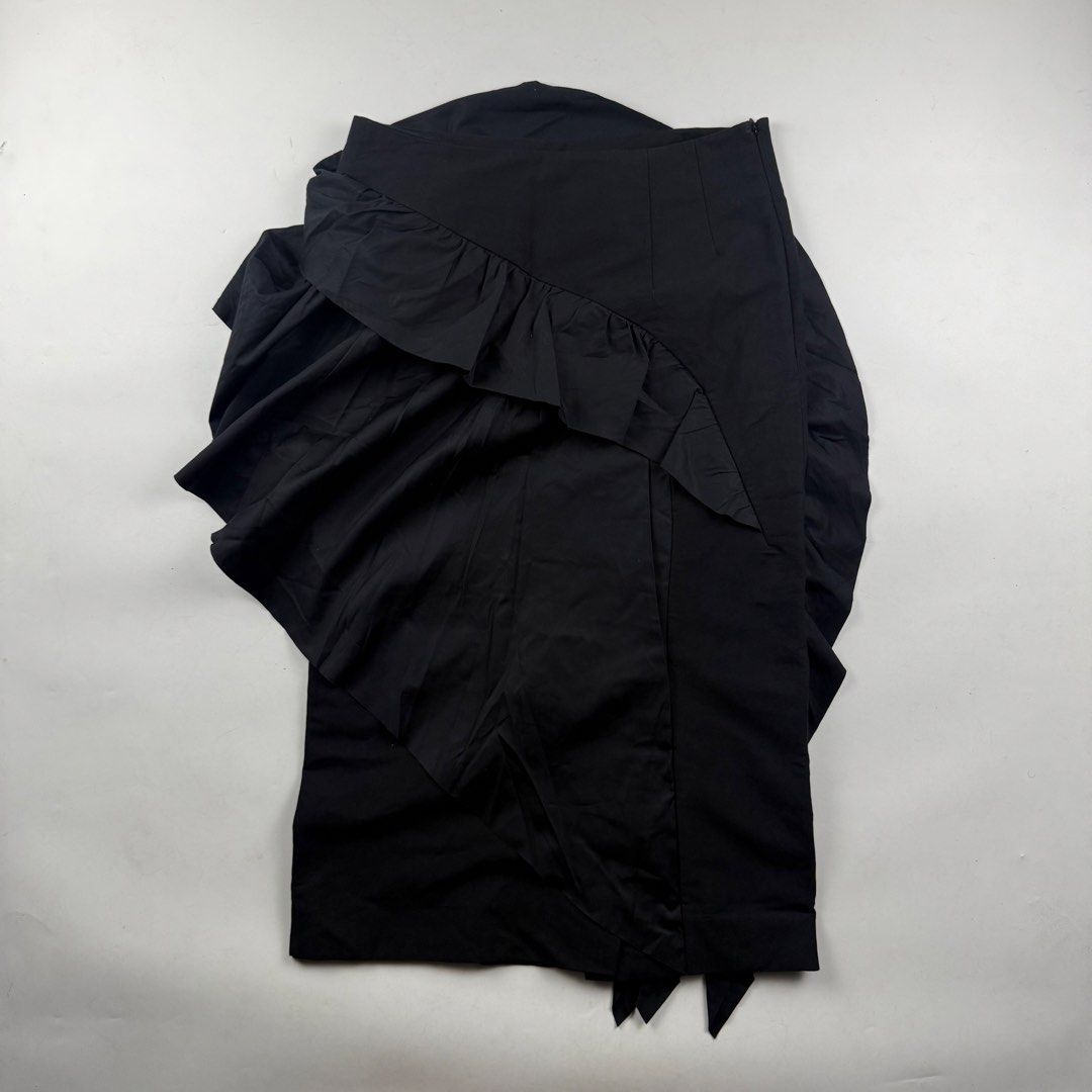 Dries Van Noten Asymmetrical Ruffled Midi Skirt (Category: Skirts) located in Manila. Submitted by jademax (Listing ID 1467126563, Image 2). Description: Size 38 Waist: 15” Length: 31” Leg Opening: 20”.