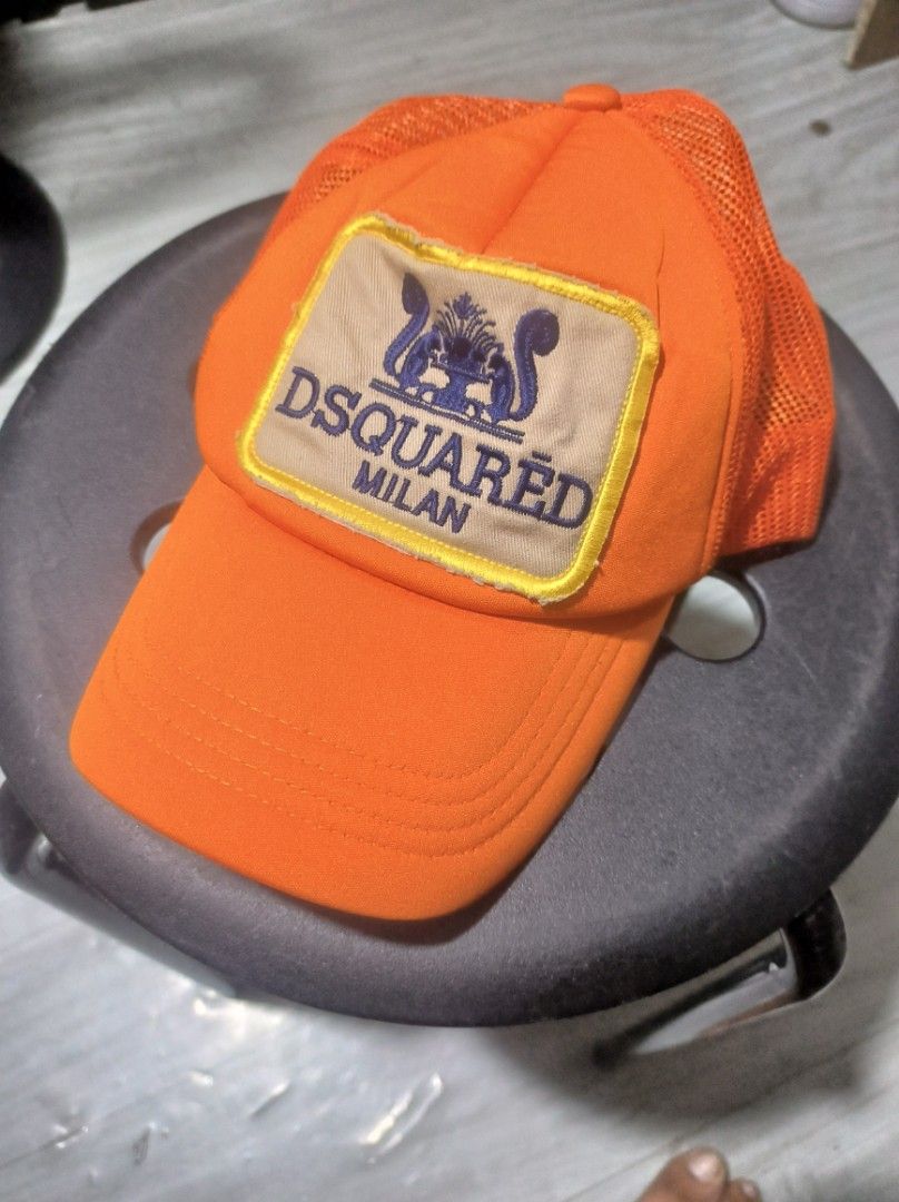 Dsquared Milan orange trucker hat (Category: Caps & Hats) located in Valenzuela. Submitted by henoh. (Listing ID 1467033901, Image 1). Description: Dsquared Milan trucker hat with "knok knok who's there? " details at the back. made in italy . color: orange 9/10 size: OSFA.