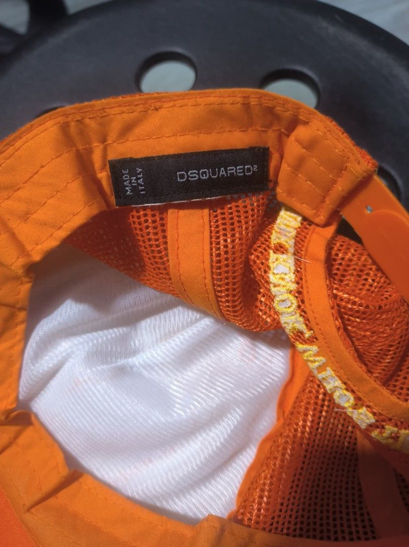 Dsquared Milan orange trucker hat (Category: Caps & Hats) located in Valenzuela. Submitted by henoh. (Listing ID 1467033901, Image 3). Description: Dsquared Milan trucker hat with "knok knok who's there? " details at the back. made in italy . color: orange 9/10 size: OSFA.