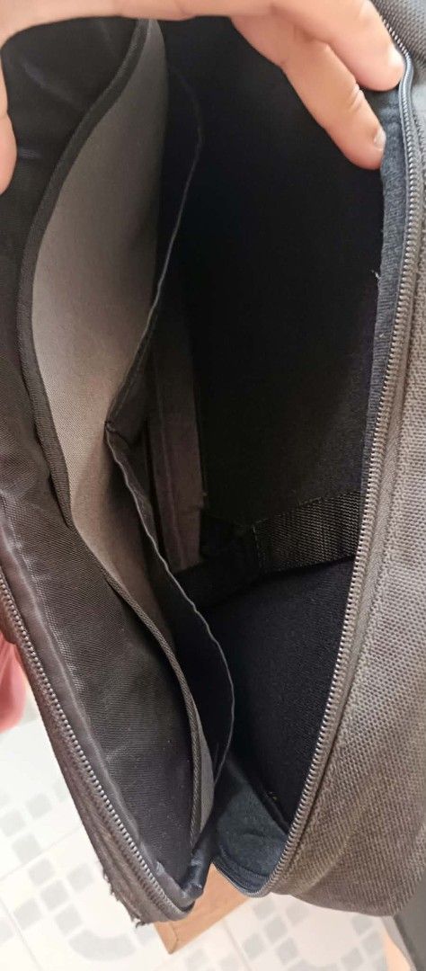 Duluth Trading Co Master Series Briefcase Laptop Bag (Category: Briefcases) located in Dimasalang. Submitted by tinzstory (Listing ID 1466972789, Image 3). Description: • Brand & Model: Duluth Trading Co. Master Series (Authentic US brand) • Material & Design: Thick canvas material with a leather brand logo patch and multiple organized compartments for a laptop, documents, and office essentials. • Condition: Preloved/Used. Has some storage dust t
