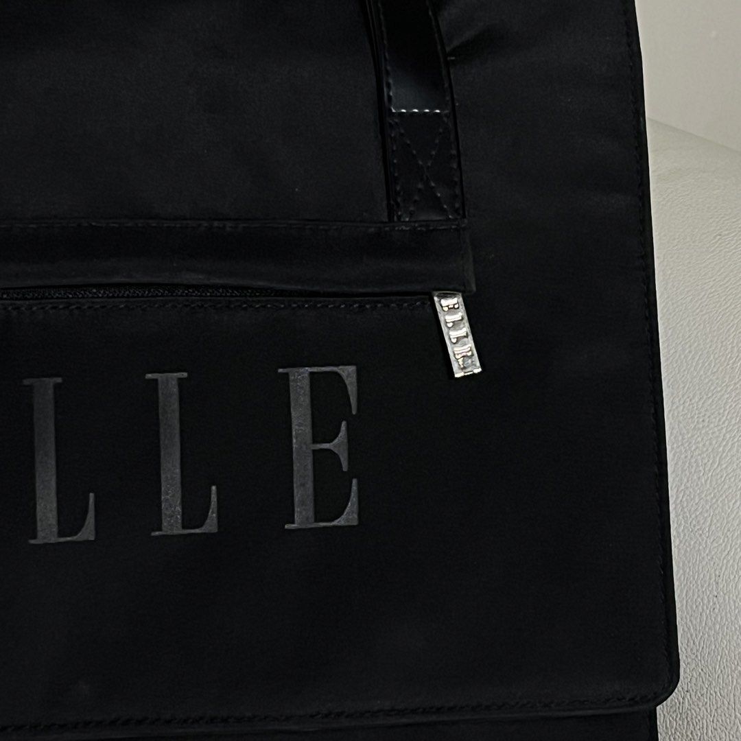 ELLE Designer Classic Black Tote (Category: Tote Bags) located in Manila. Submitted by ave.archives (Listing ID 1467159179, Image 3). Description: Original Elle Designer bag, medium sized perfect to use as school bag & office work bag as it can fit big ipads& 12-13in macbook & more Quezon City | Lalamove & J&T shipping.