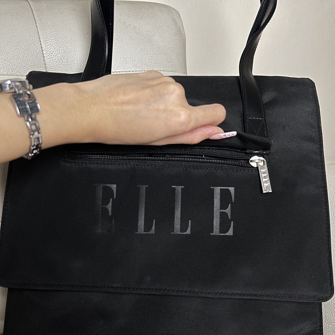 ELLE Designer Classic Black Tote (Category: Tote Bags) located in Manila. Submitted by ave.archives (Listing ID 1467159179, Image 2). Description: Original Elle Designer bag, medium sized perfect to use as school bag & office work bag as it can fit big ipads& 12-13in macbook & more Quezon City | Lalamove & J&T shipping.