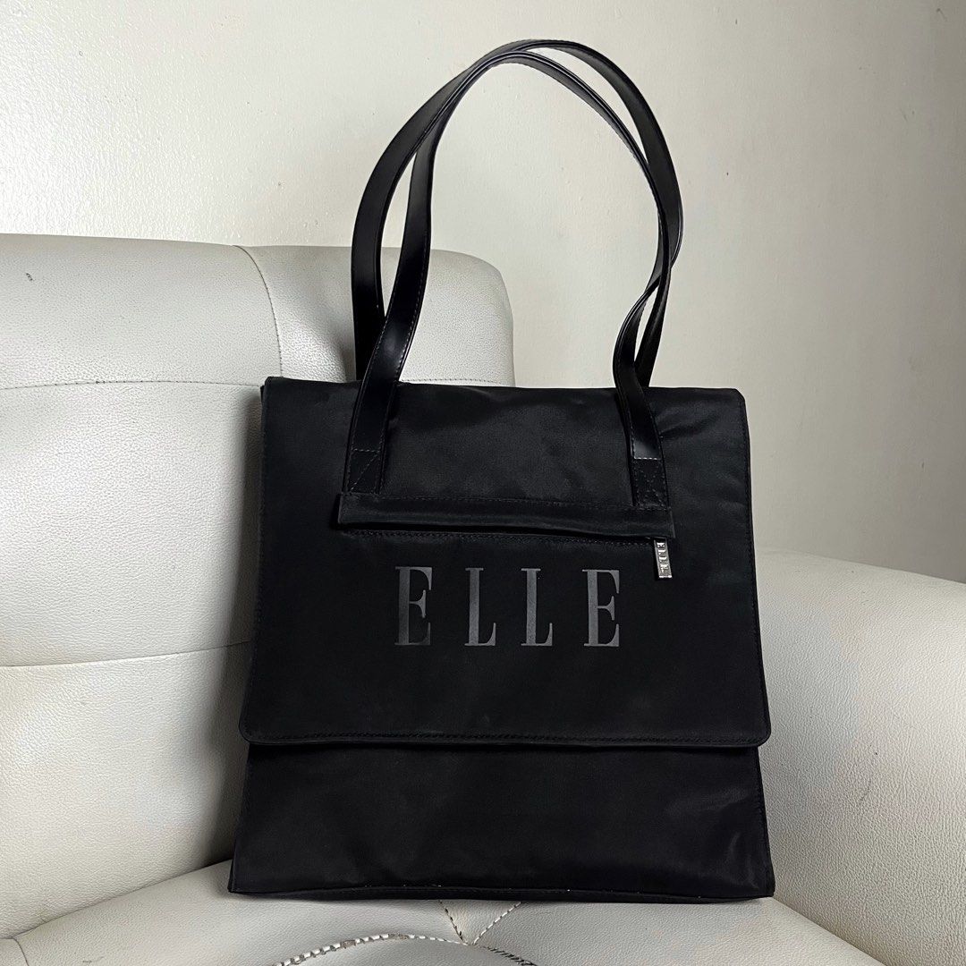 ELLE Designer Classic Black Tote (Category: Tote Bags) located in Manila. Submitted by ave.archives (Listing ID 1467159179, Image 1). Description: Original Elle Designer bag, medium sized perfect to use as school bag & office work bag as it can fit big ipads& 12-13in macbook & more Quezon City | Lalamove & J&T shipping.