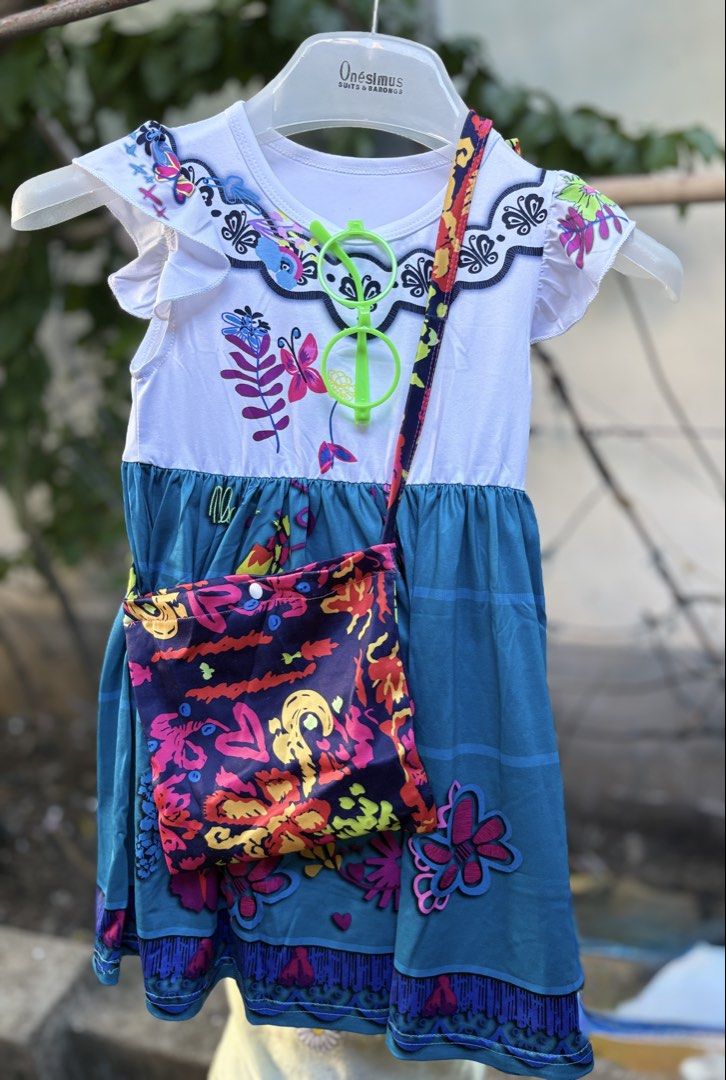 Encanto Costume - Mirabel Madrigal (Category: Babies & Kids Fashion) located in Catarman. Submitted by hyukissco (Listing ID 1467011601, Image 1). Description: Comes with lesless glasses + sling bag Once lang nagamit ng babygirl ko hehe Slightly negotiable 4-5 yo girl.
